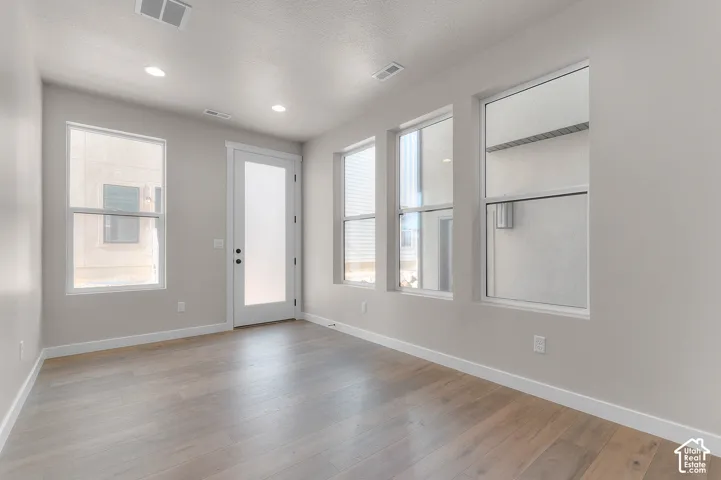Wood-finish flooring with white trim