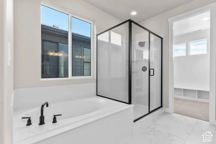 Soaking tub with matte black fixtures