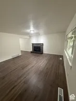 Wood-finish flooring throughout
