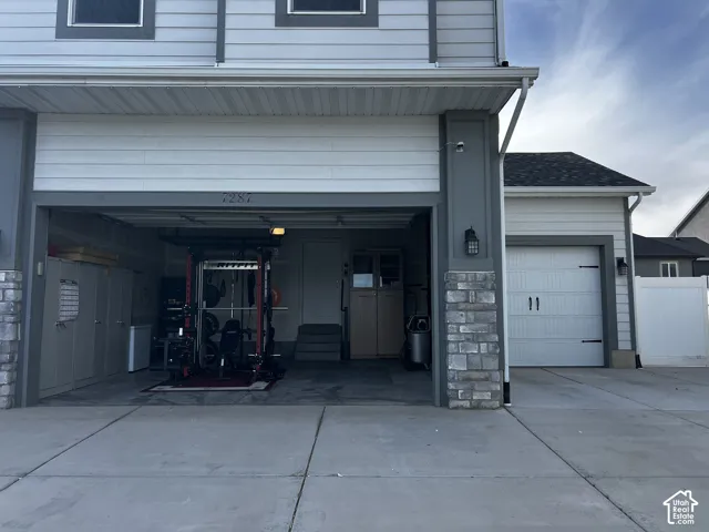 Attached garage with dual overhead doors