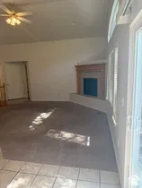 Vaulted ceiling featuring a ceiling fan with integrated lighting