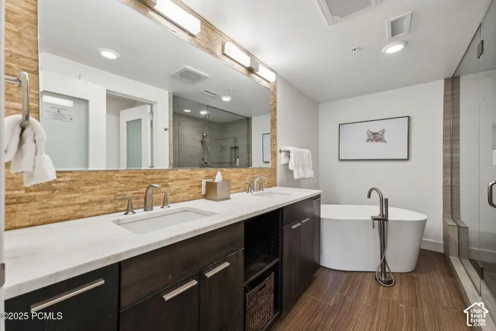 Dual vanity with integrated sinks and a stone countertop