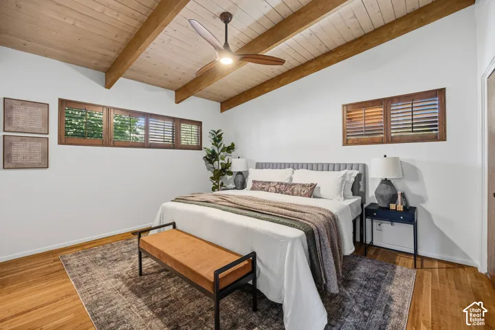 Vaulted wood-paneled ceiling with exposed beams