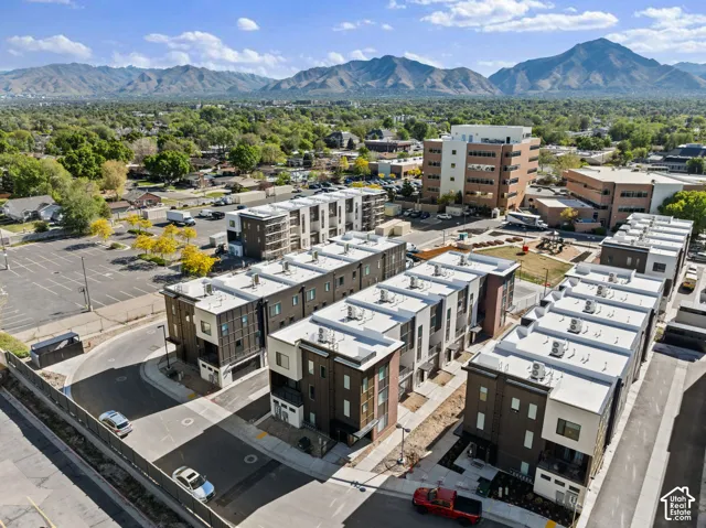 Modern townhome community featuring contemporary architectural design and mountain scenery