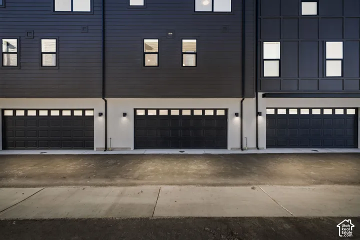 Modern multi-level exterior with dark horizontal siding