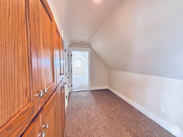 Upstairs storage and game area, could be converted easily to be part of apartment - looking towards the apartment inside entrance.