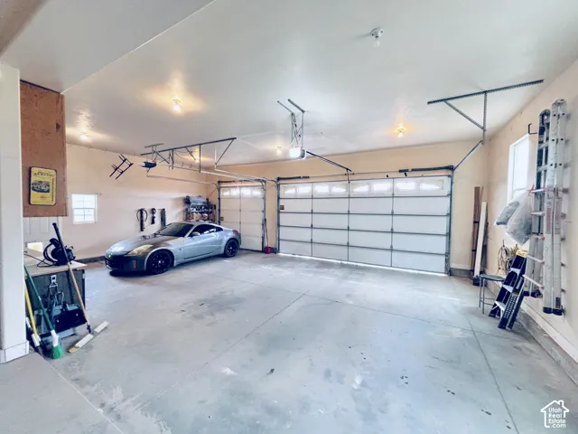 Attached oversized 3 car garage.