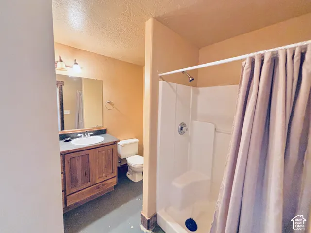 Shop bathroom within barn/shop. This bathroom is separate from the ADU bathroom.
