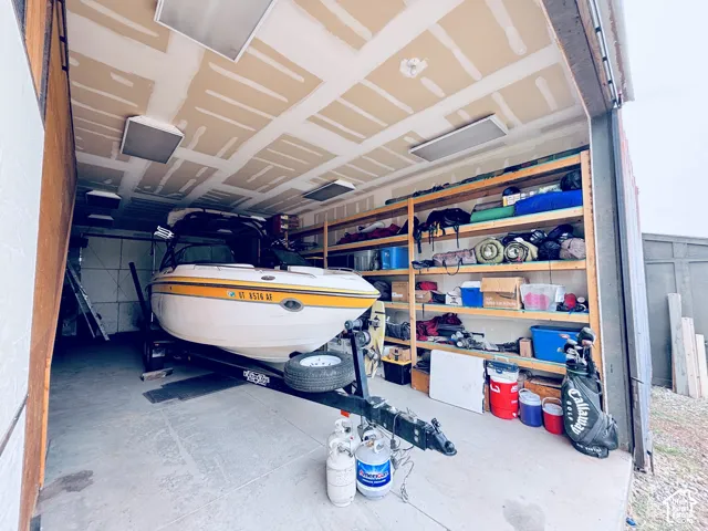 Spacious RV storage area with shelving - Barn structure.