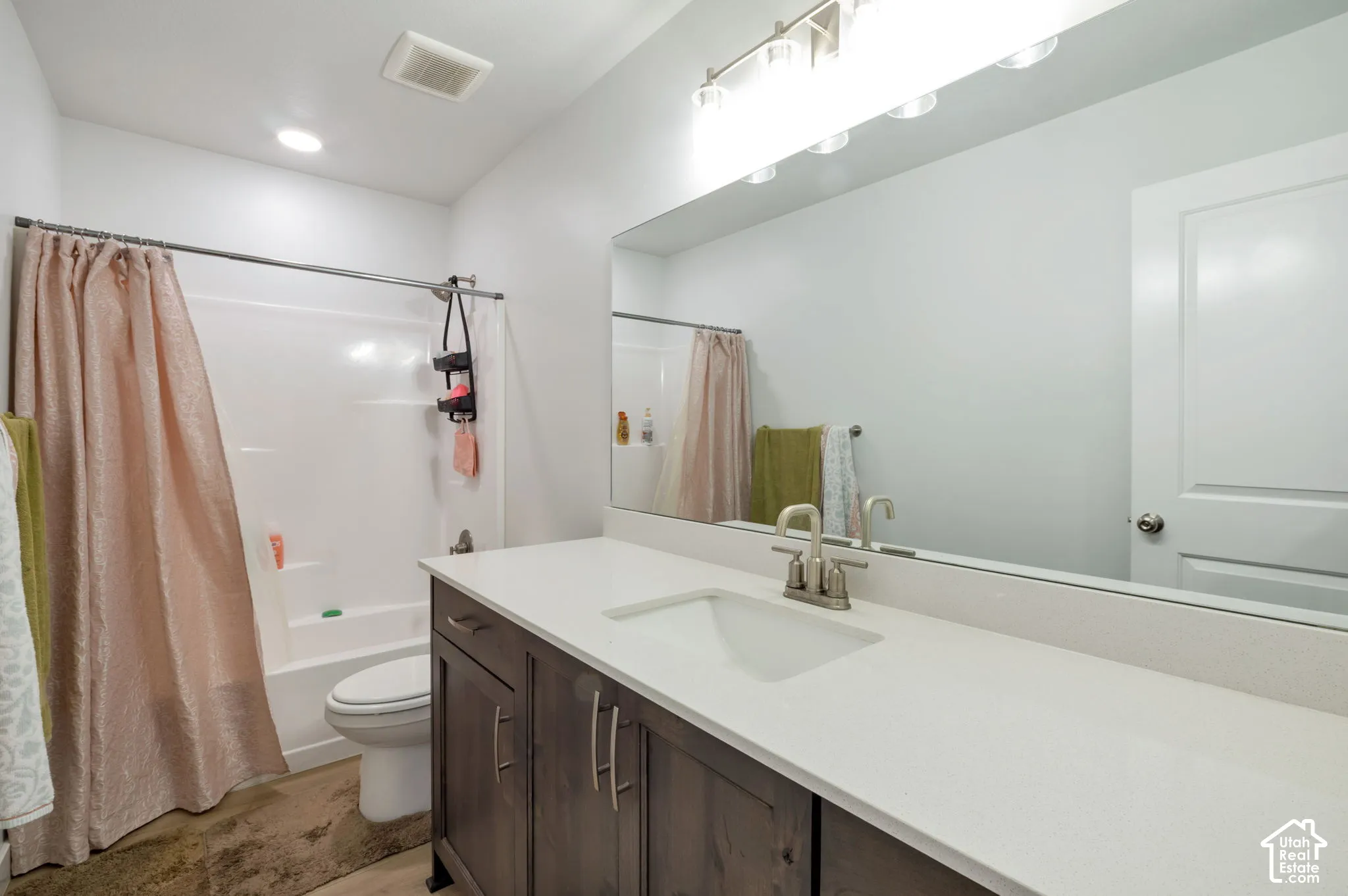 White solid surface countertop with integrated sink