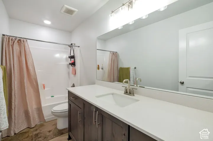 White solid surface countertop with integrated sink