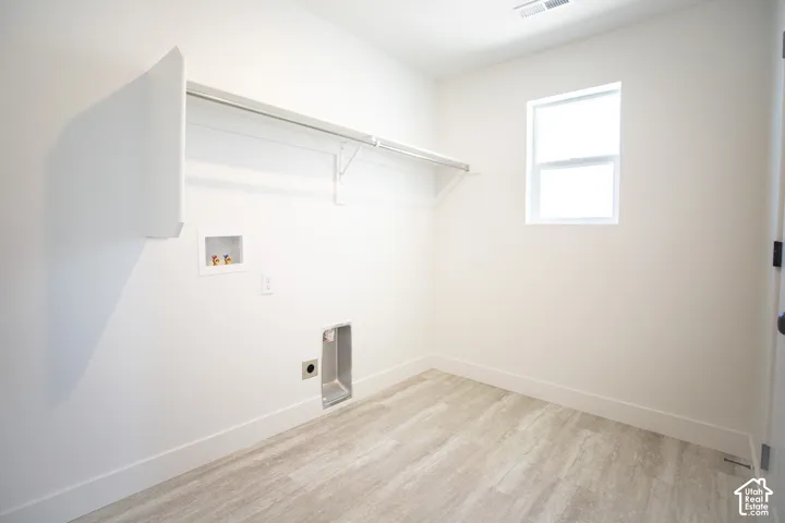 Full-size, dedicated laundry room with washer/dryer hookups.