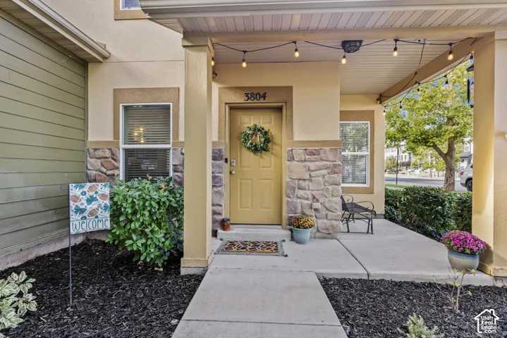 Stucco and stone facade with a covered porch