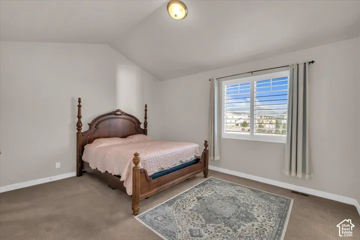 Vaulted ceiling with an overhead light fixture