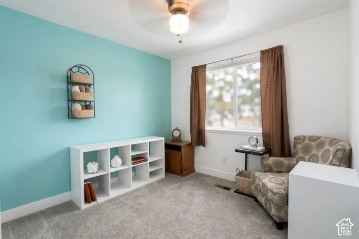 Recessed lighting and ceiling fan overhead
