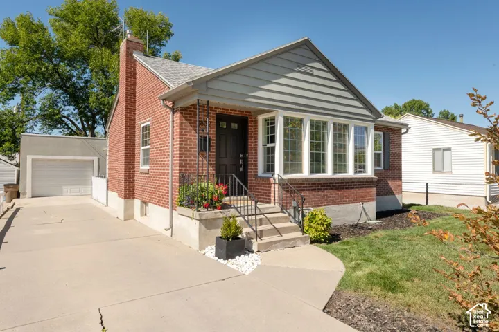 Brick exterior with gray siding accents