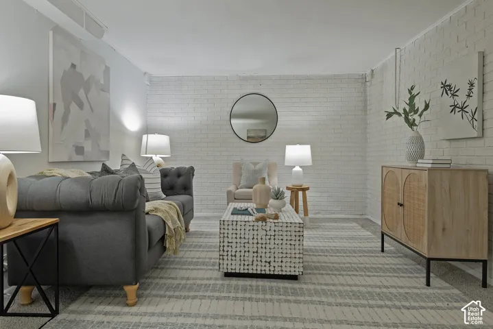 Accent brick wall, light carpeting