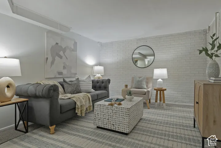 Textured accent wall, light carpet