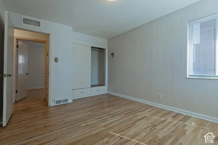 Wood flooring with white base trim