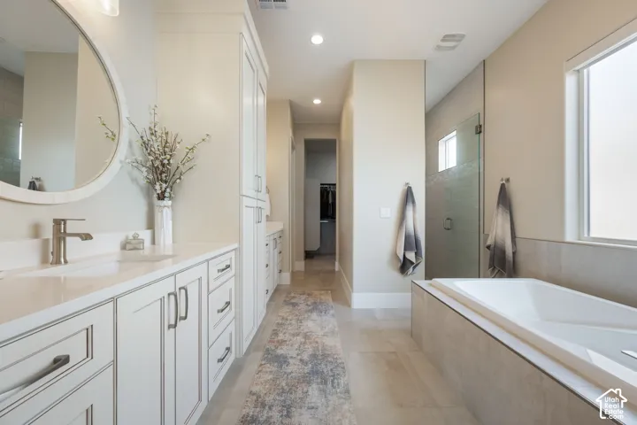 Dual vanities with shaker-style cabinetry