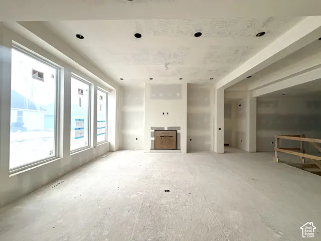 Three large windows provide ample natural light