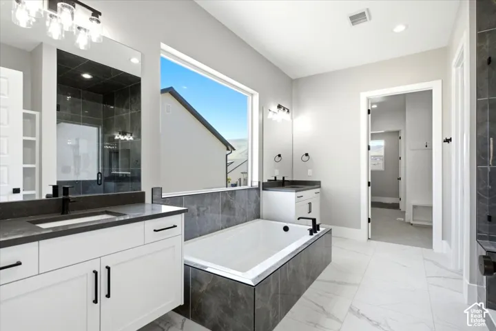 Dual vanities with matte black hardware