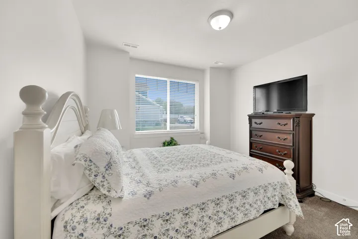 Recessed window with horizontal blinds, overhead flush mount light fixture