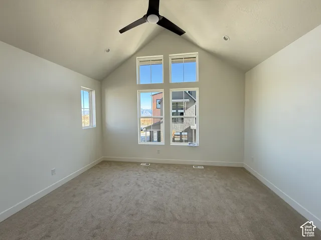 Owner's Suite featuring vaulted ceiling with recessed lighting and a black ceiling fan
