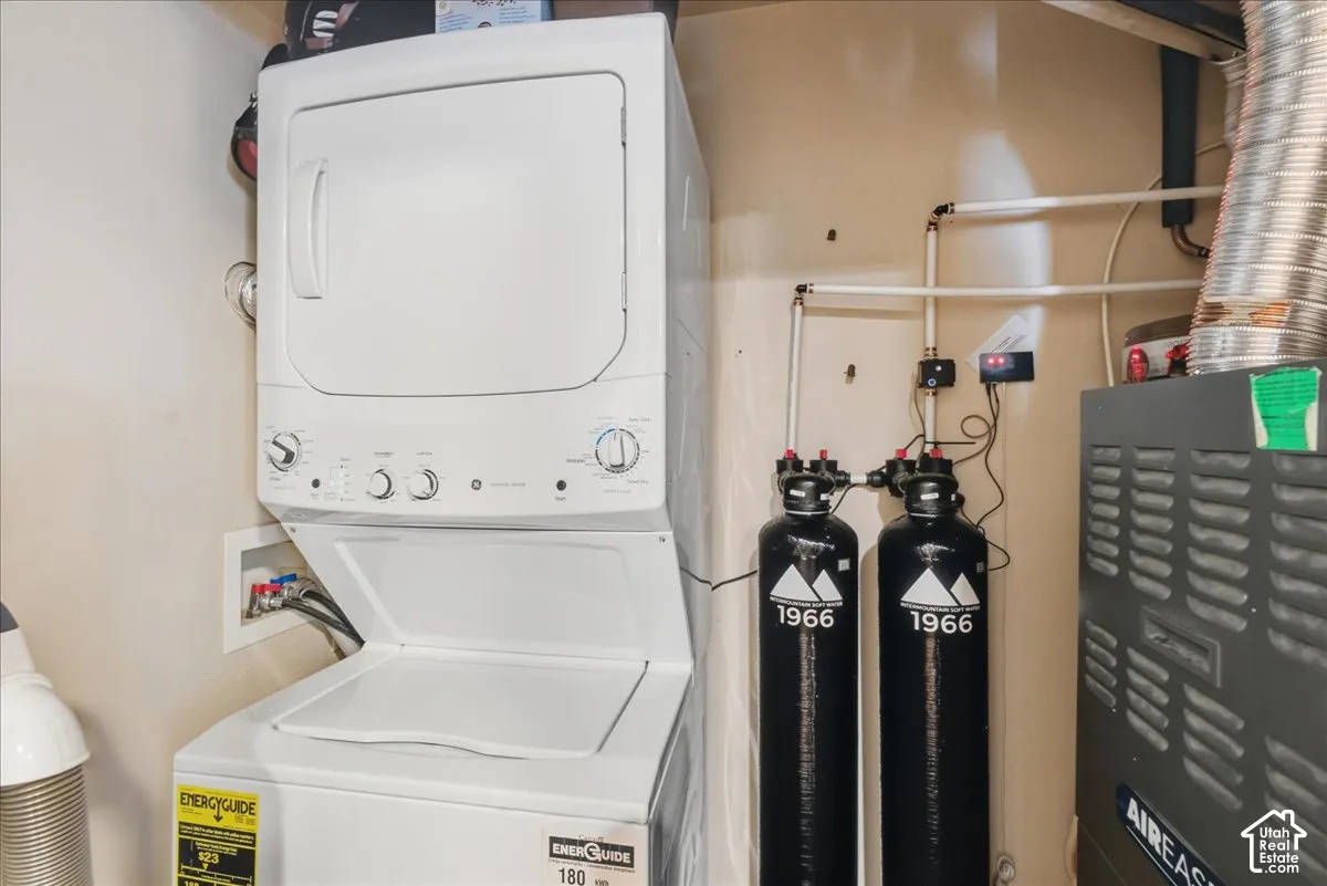 Stackable laundry appliances, water filtration system, and furnace unit