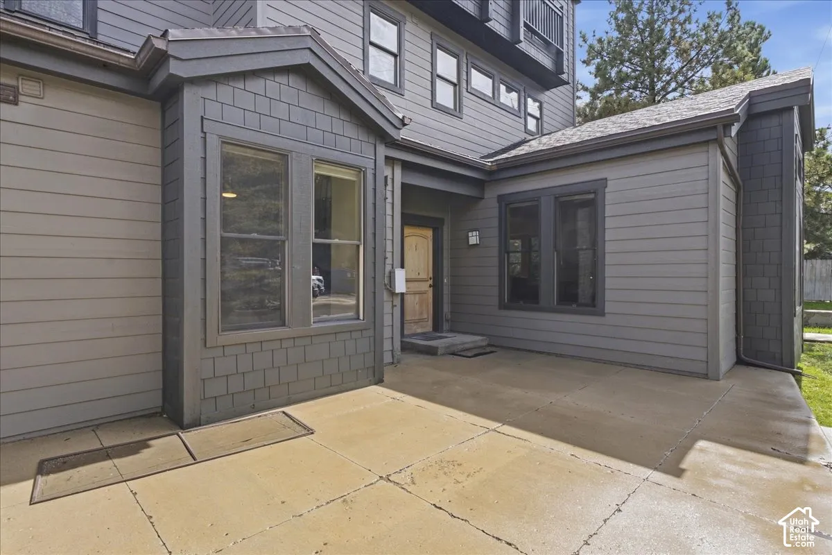 Multi-level exterior with horizontal siding and shake accents