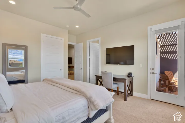 Recessed lighting, ceiling fan, carpet flooring, panel doors, and outdoor patio access