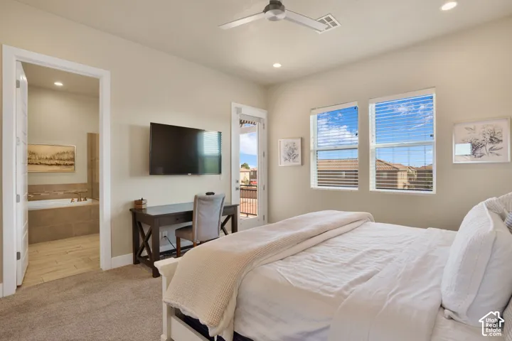 Carpeted bedroom with a ceiling fan, recessed lighting, and dual windows with blinds