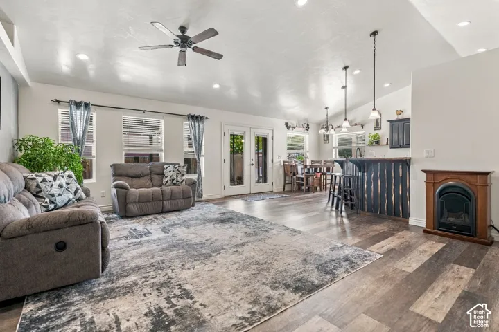 Wood-finish flooring throughout, recessed lighting, and a ceiling fan