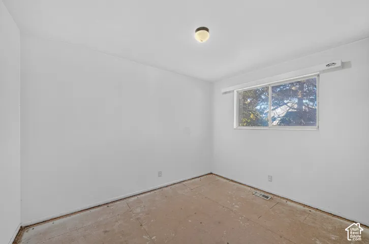 Window with outdoor scenery, ceiling-mounted light fixture