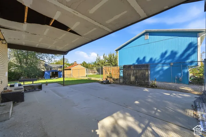 Covered patio with a concrete surface