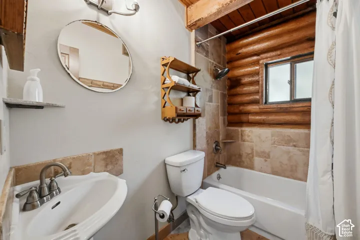 Tile-surround bathtub with integrated window