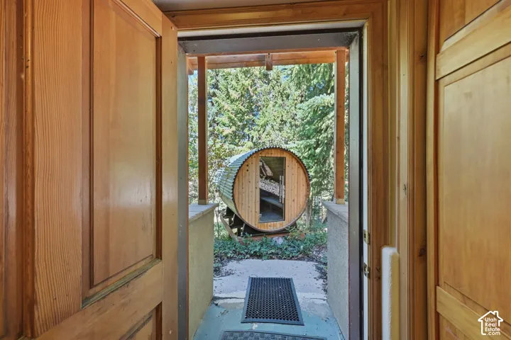 Wood paneling, wood-frame door, exterior barrel structure
