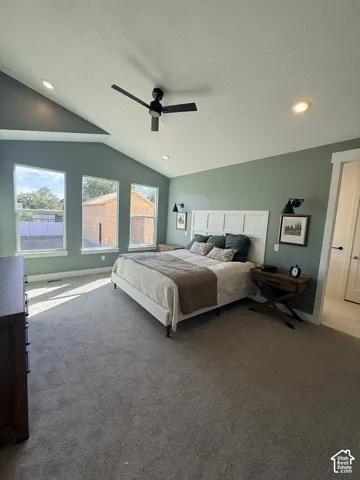 Vaulted ceiling with recessed lighting and ceiling fan
