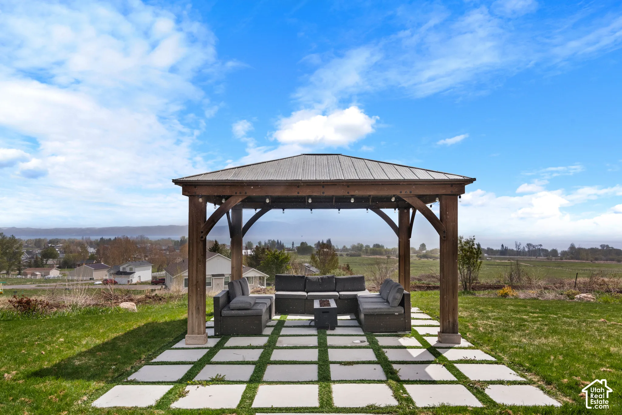 Wood-frame gazebo with a corrugated metal roof