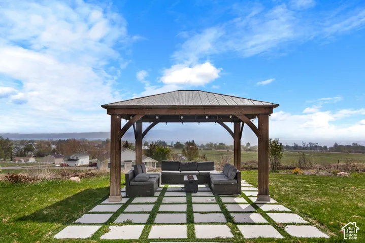 Wood-frame gazebo with a corrugated metal roof