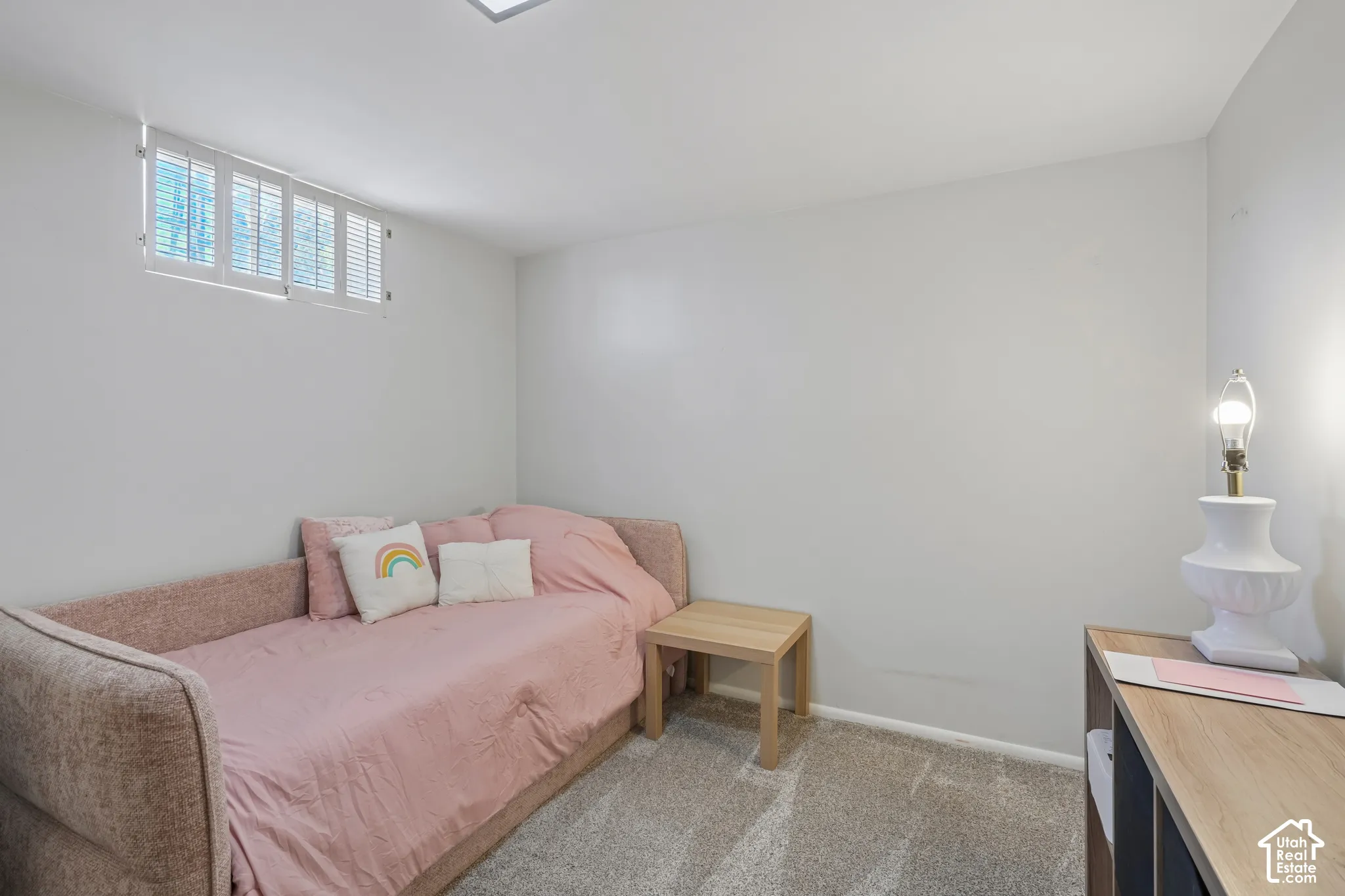 Wall-to-wall carpeting with a low-profile pile