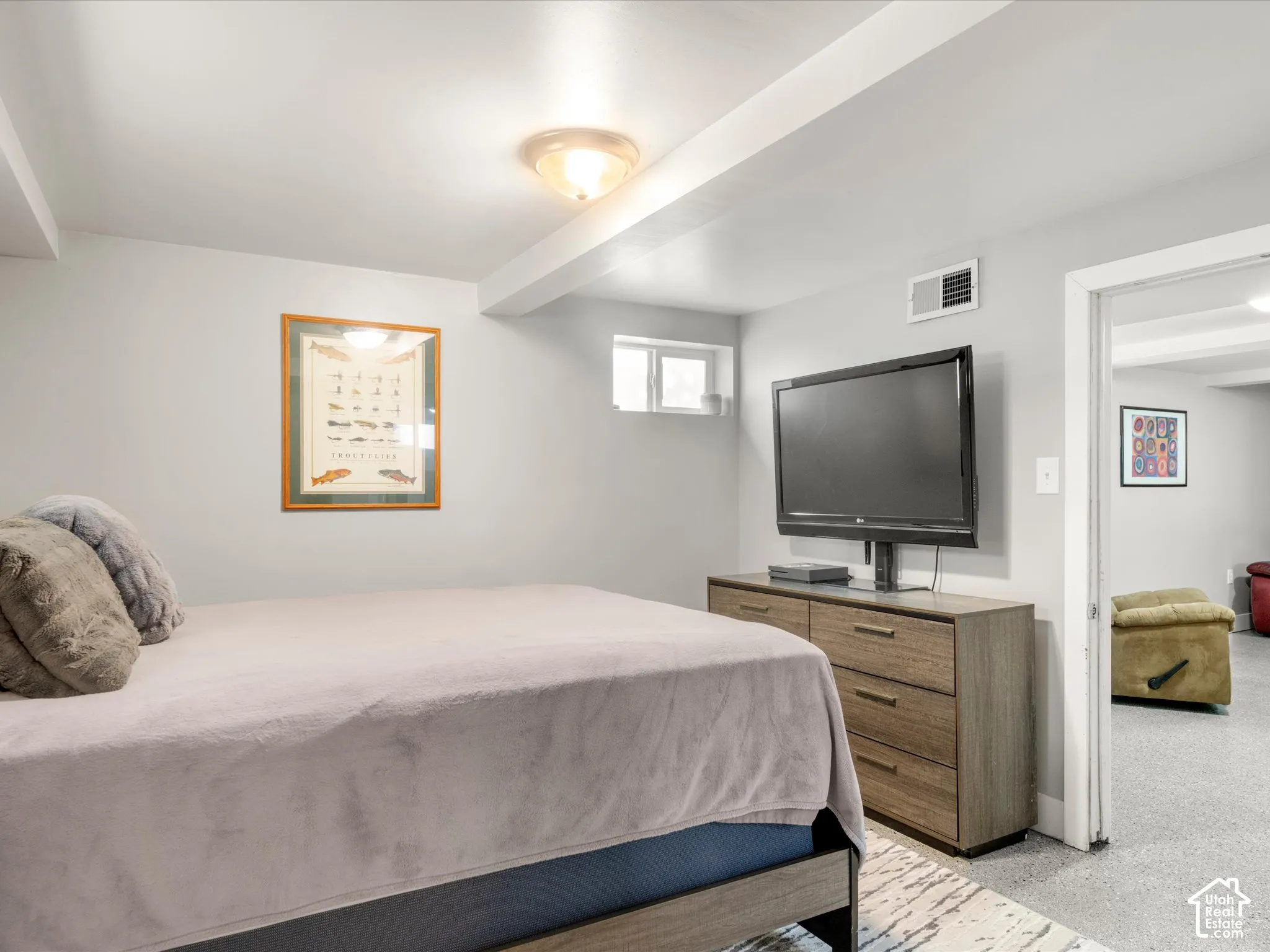 Recessed lighting, wood-finish flooring, and light gray wall paint