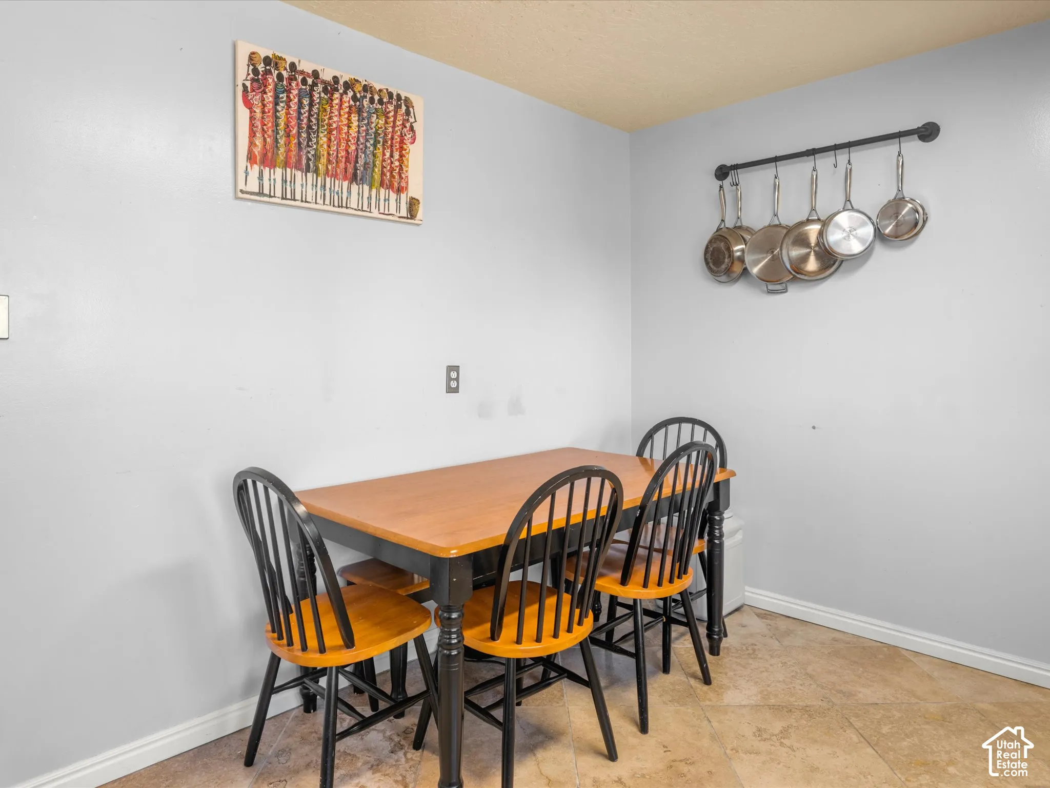Tiled flooring with contrasting baseboards