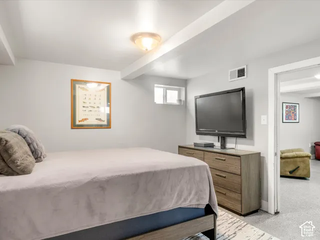 Recessed lighting, wood-finish flooring, and light gray wall paint