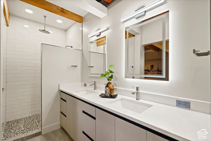 Dual vanity with integrated sinks and white countertops