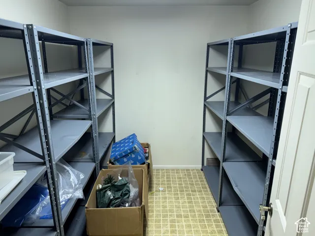 Storage area with two metal shelving units