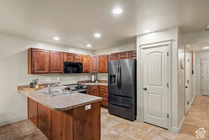 Kitchen with bar seating and pantry