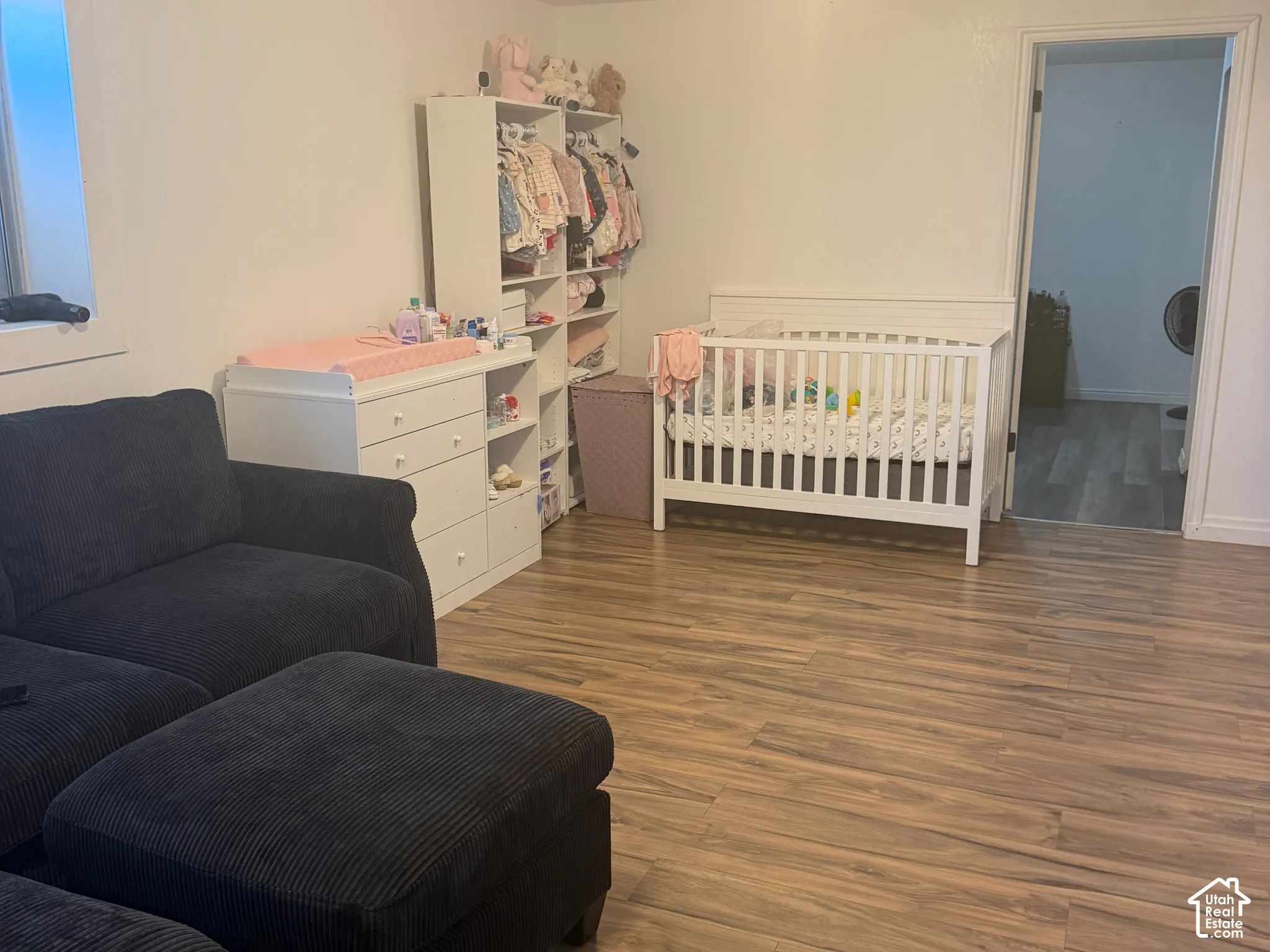 Wood-finish flooring throughout the space