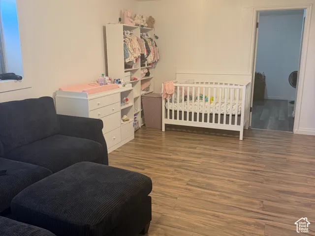 Wood-finish flooring throughout the space