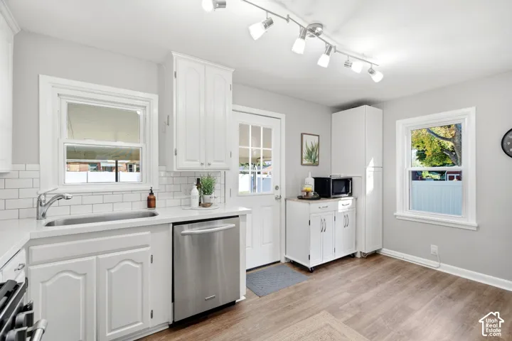 Superior natural light, back door leading to covered patio and garage.